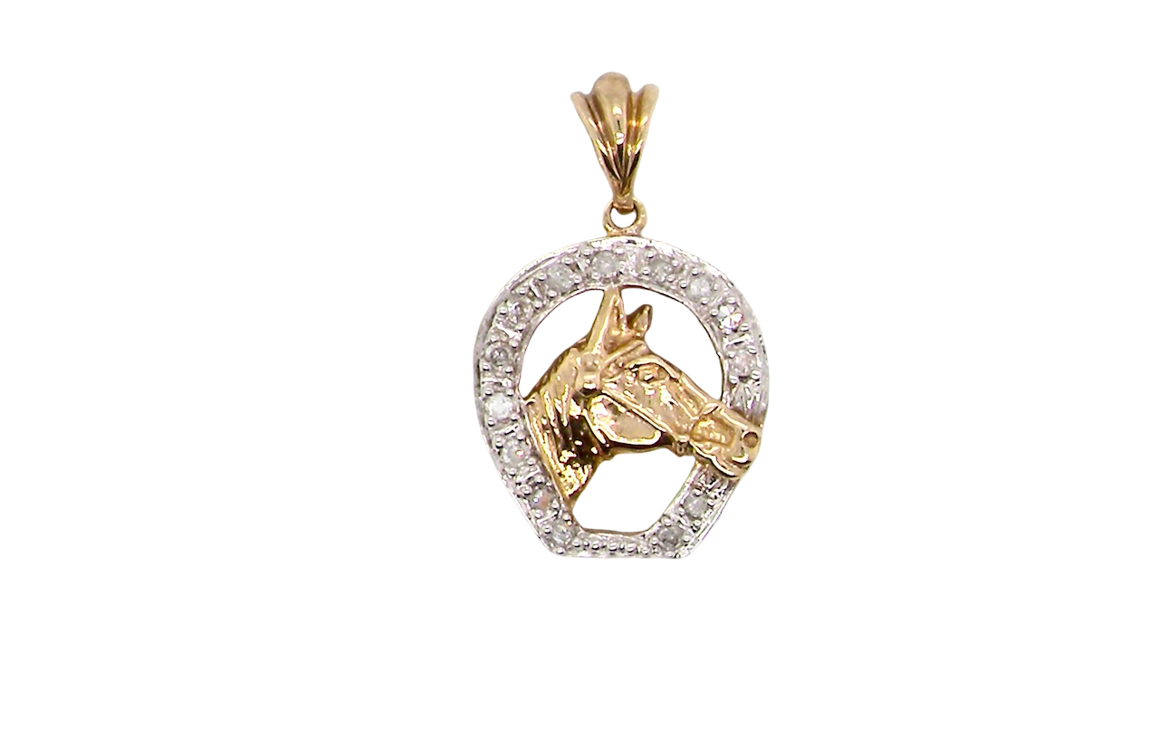 Gold and silver horse pendant on a white background