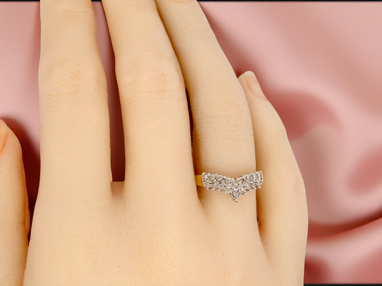 A diamond wishbone ring