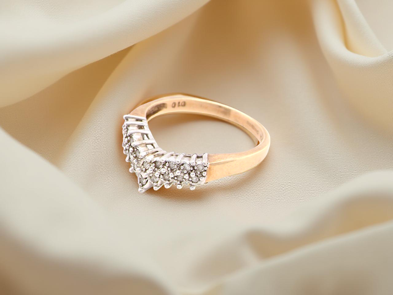 A diamond wishbone ring