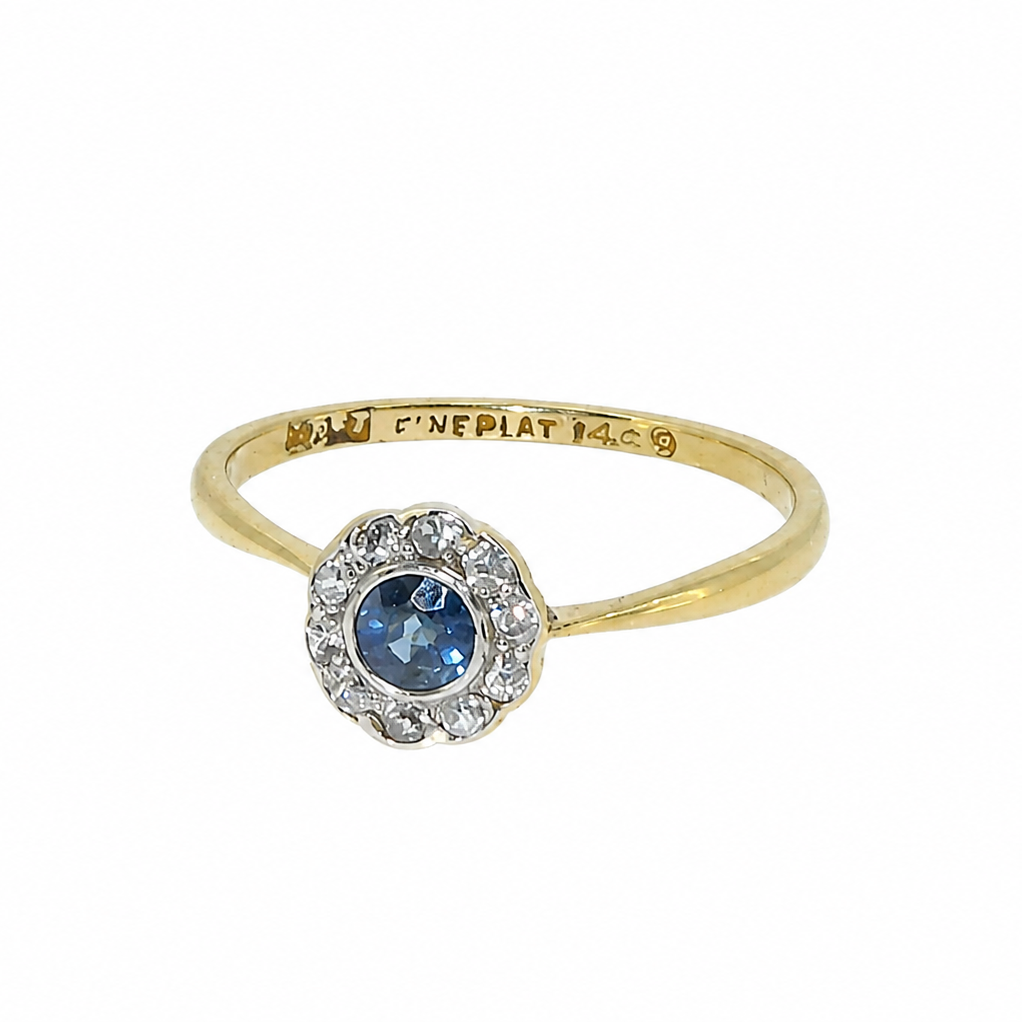 An Edwardian sapphire and diamond cluster ring