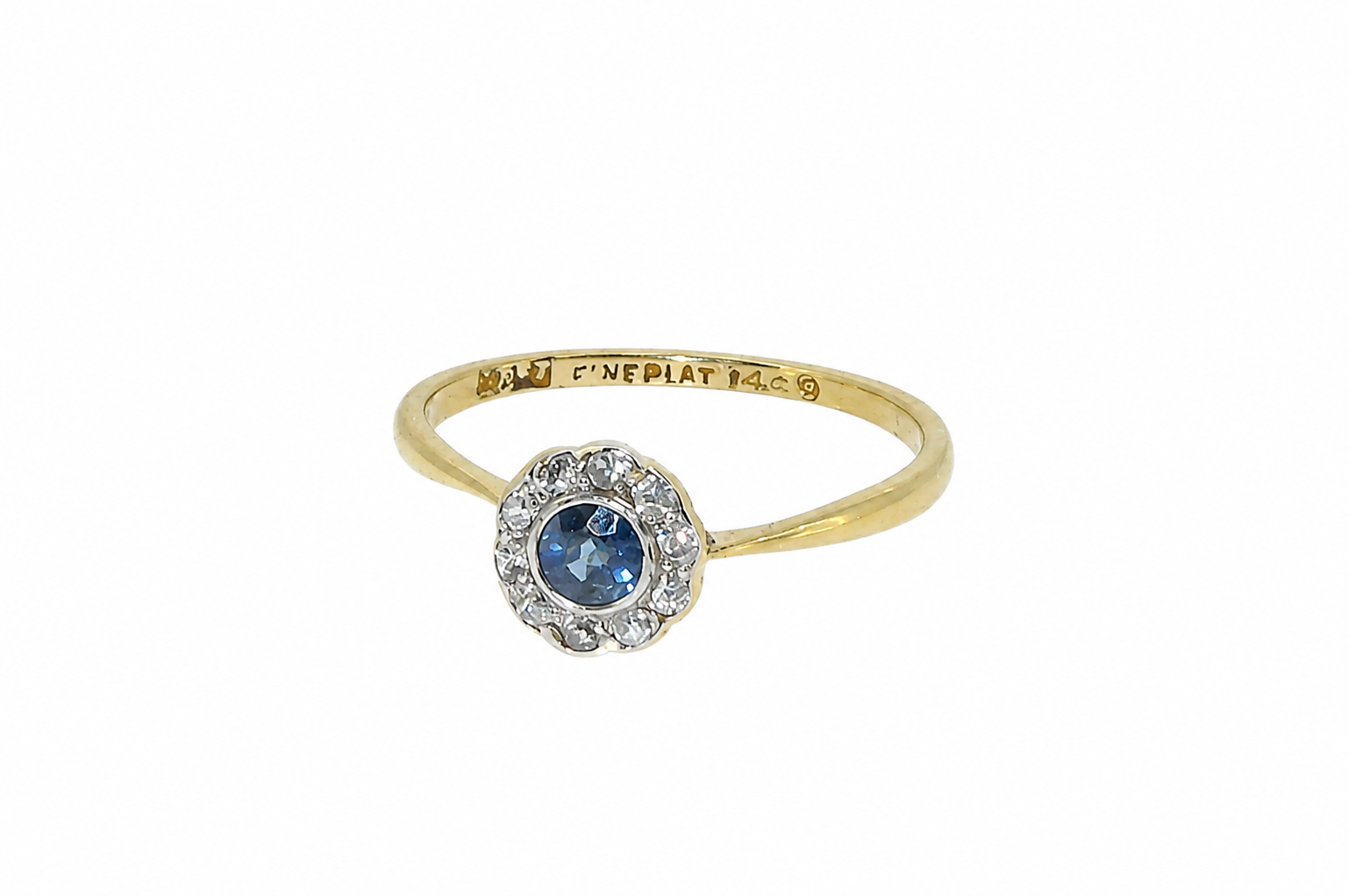 An Edwardian sapphire and diamond cluster ring