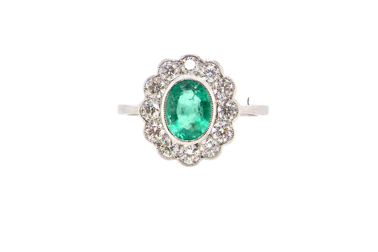 A fabulous Emerald and Diamond cluster ring
