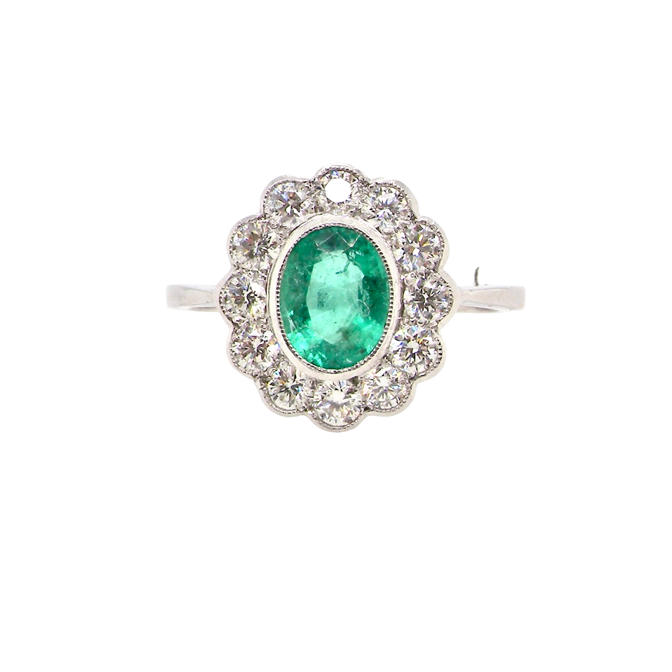 A fabulous Emerald and Diamond cluster ring