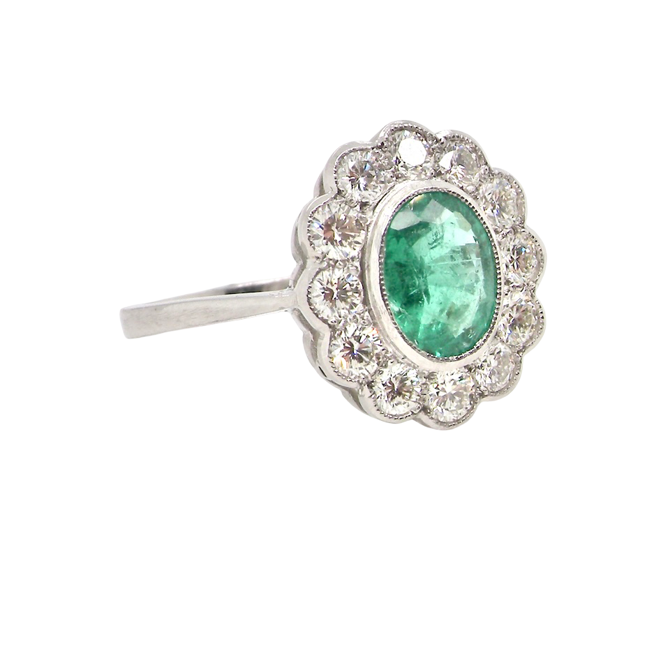 A fabulous Emerald and Diamond cluster ring