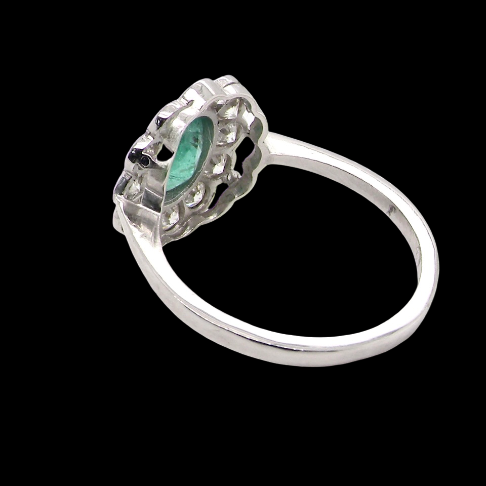 A fabulous Emerald and Diamond cluster ring