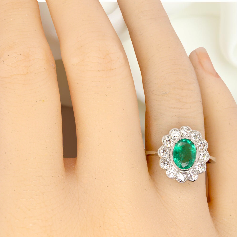 A fabulous Emerald and Diamond cluster ring