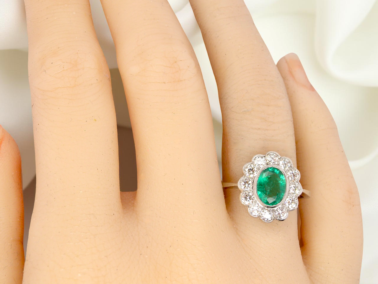 A fabulous Emerald and Diamond cluster ring
