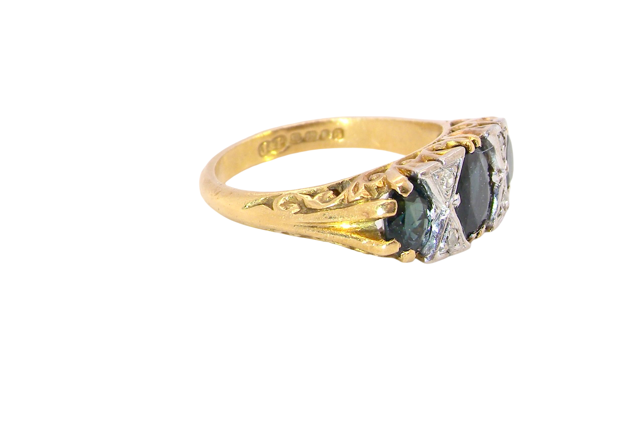 A faithful reproduction of a Victorian design. This ring from the early 1970s has copied the original boat shaped style from that period. side