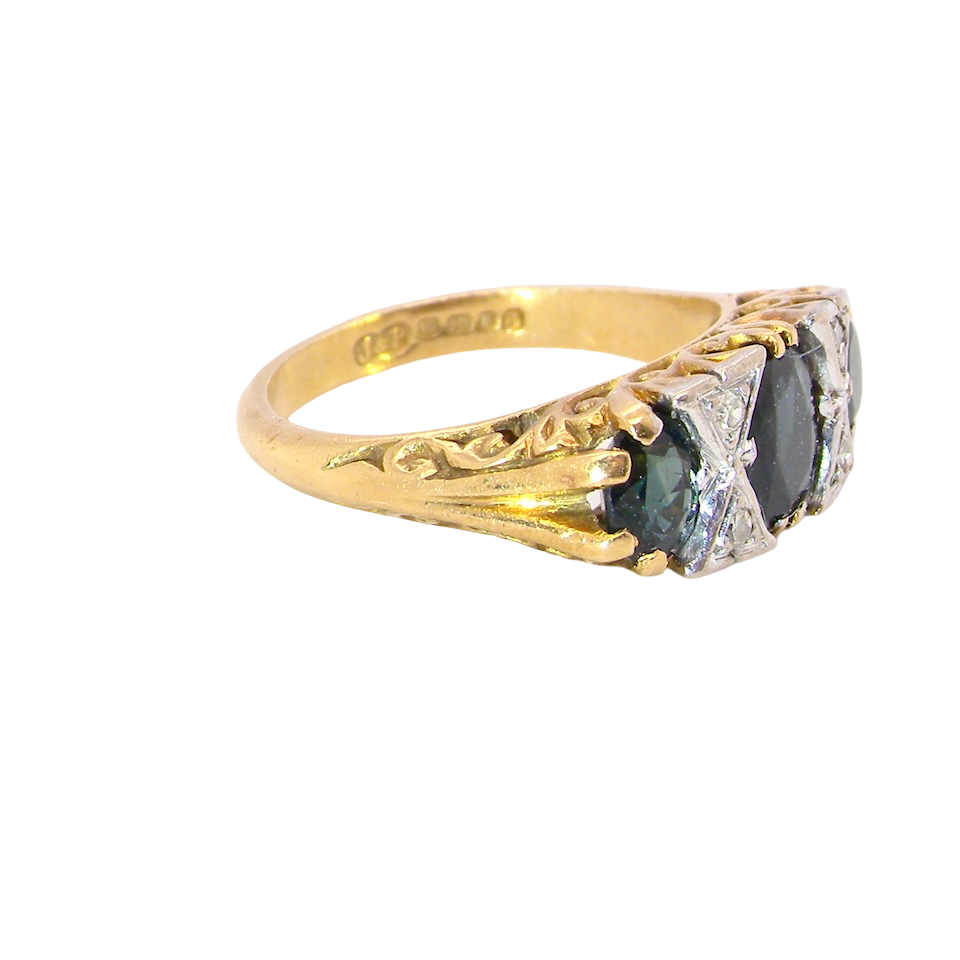 A faithful reproduction of a Victorian design. This ring from the early 1970s has copied the original boat shaped style from that period. side