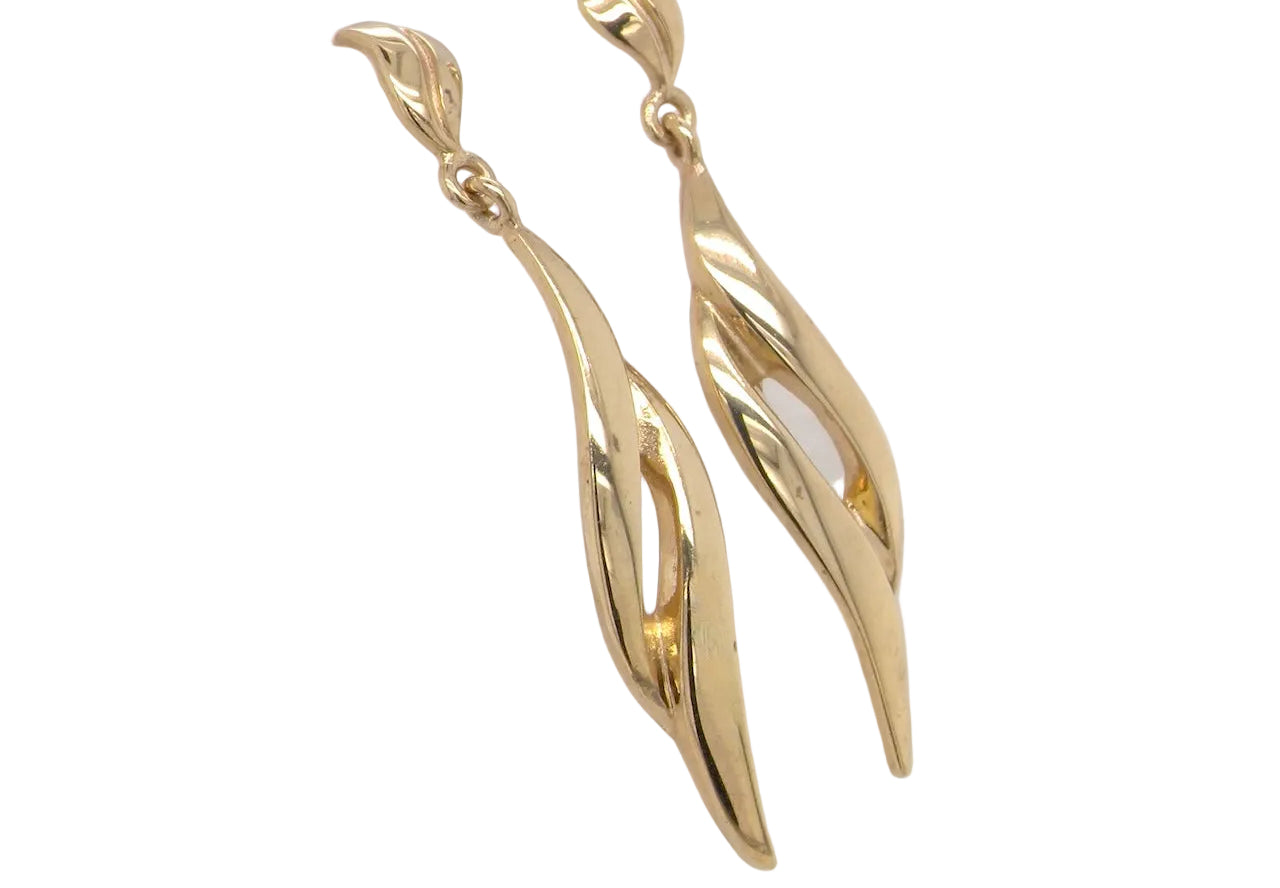 A feature pair of long drop earrings. Each a double loop that has a length of 38mm, width 8mm. shaped top to the post and scroll.