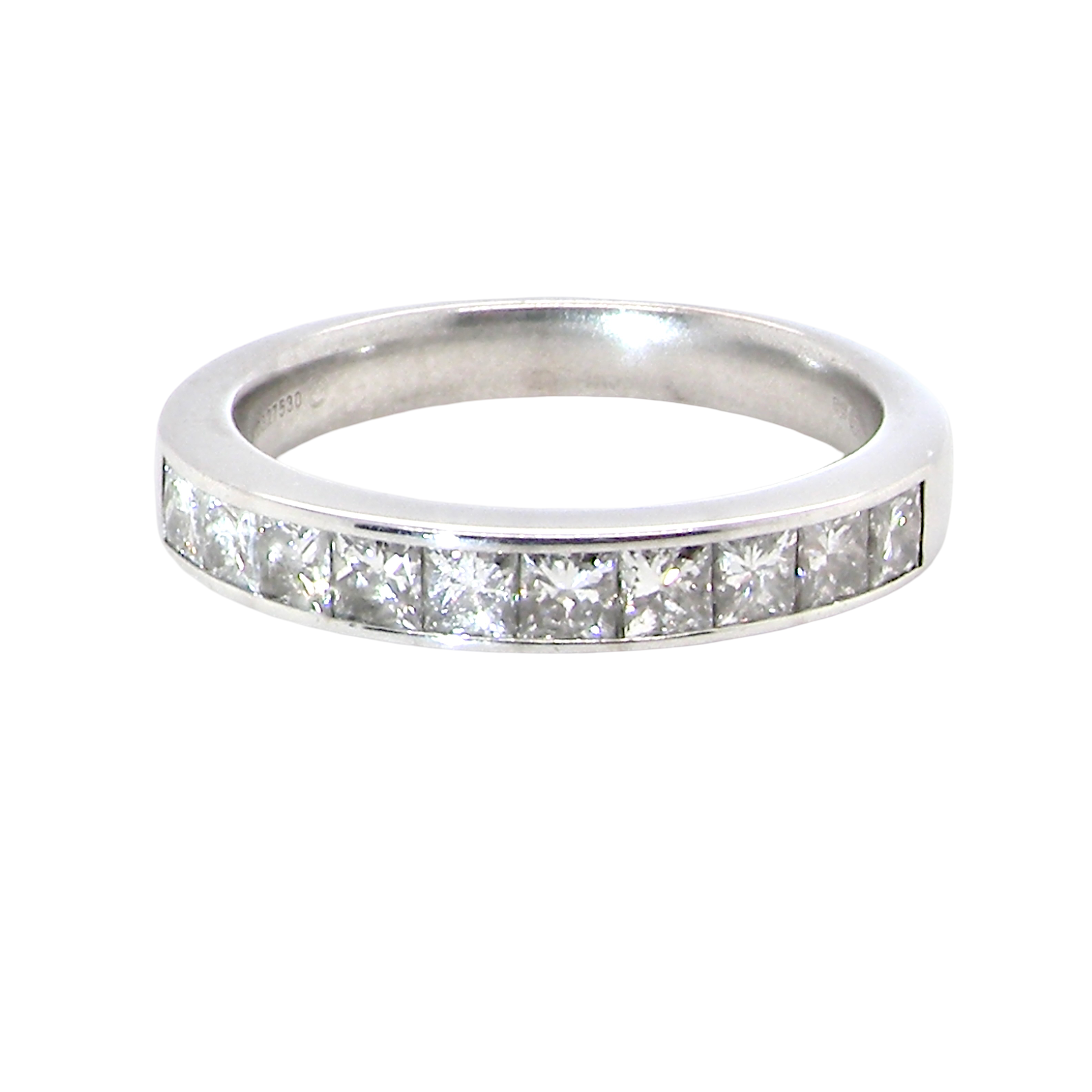 A fine 18 carat white gold half hoop eternity ring. Set with ten princess cut white diamonds.
Close set, each 2.5x2.5mm,