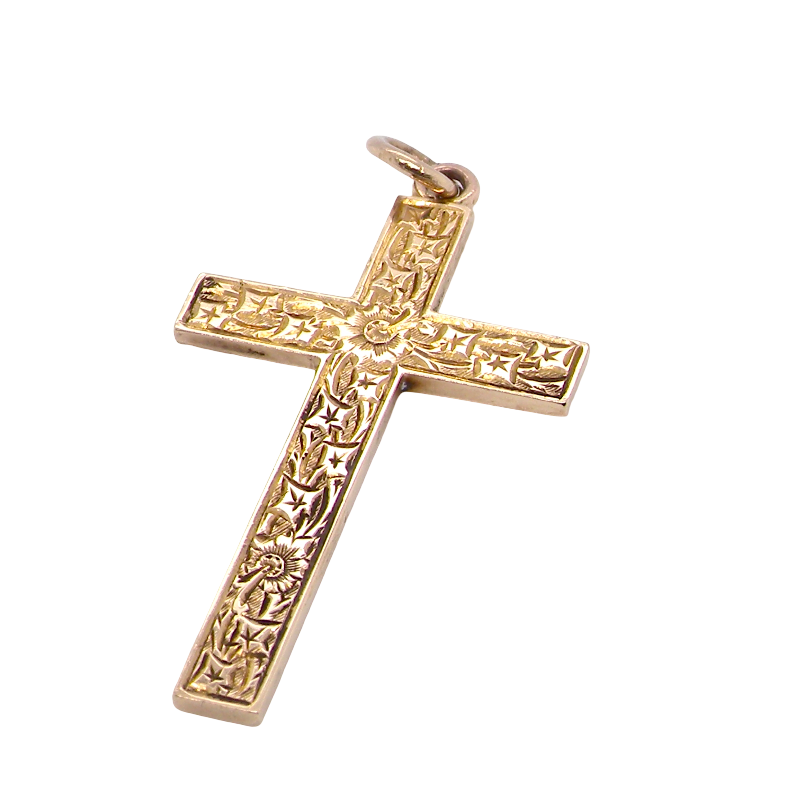 A fine 9 carat gold cross. Hand engrarved across the whole body of the cross