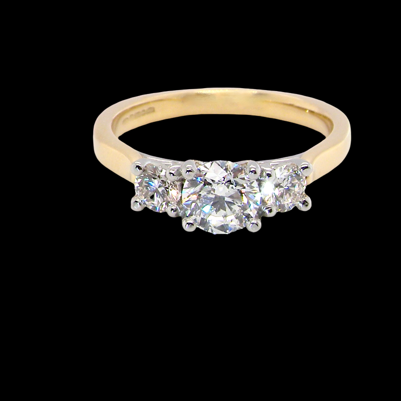 A fine and impressive three stone diamond ring, beautifully set with three graduated brilliant cut white diamonds.