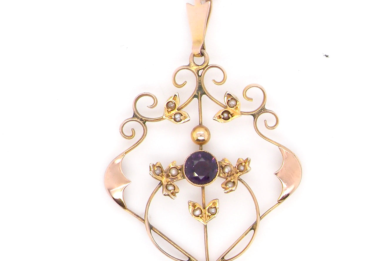 A fine antique pendant. Victorian openwork design, this impressive pendant