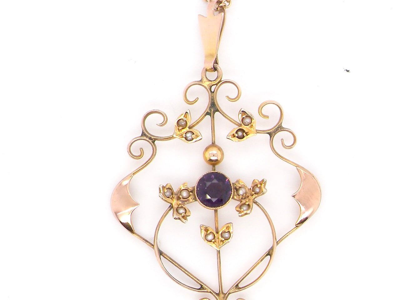 A fine antique pendant. Victorian openwork design, this impressive pendant