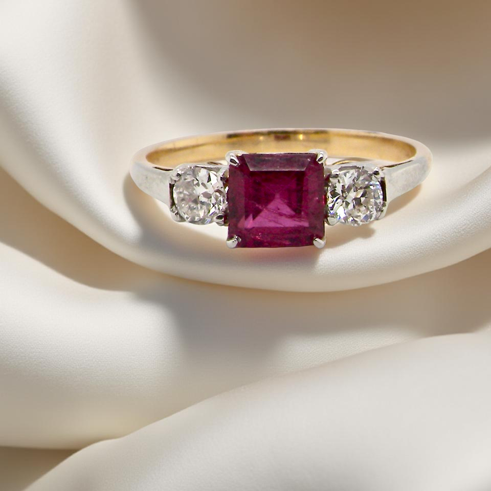 A classic Ruby and Diamond trilogy ring