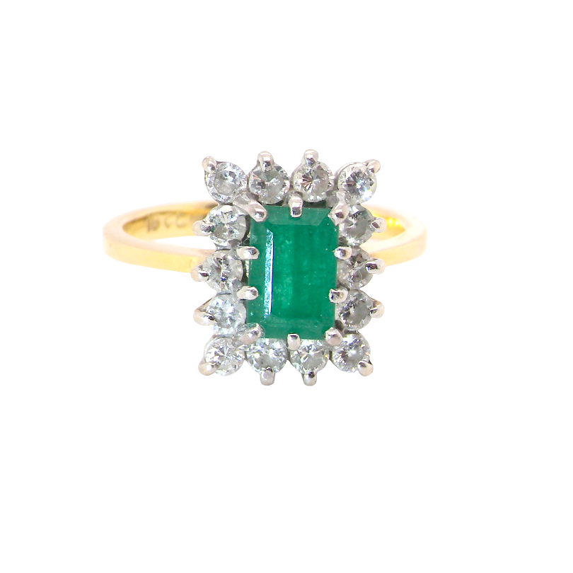 A yellow gold ring featuring a rectangular emerald-cut green gemstone surrounded by a halo of small clear round-cut stones, set against a plain white background.