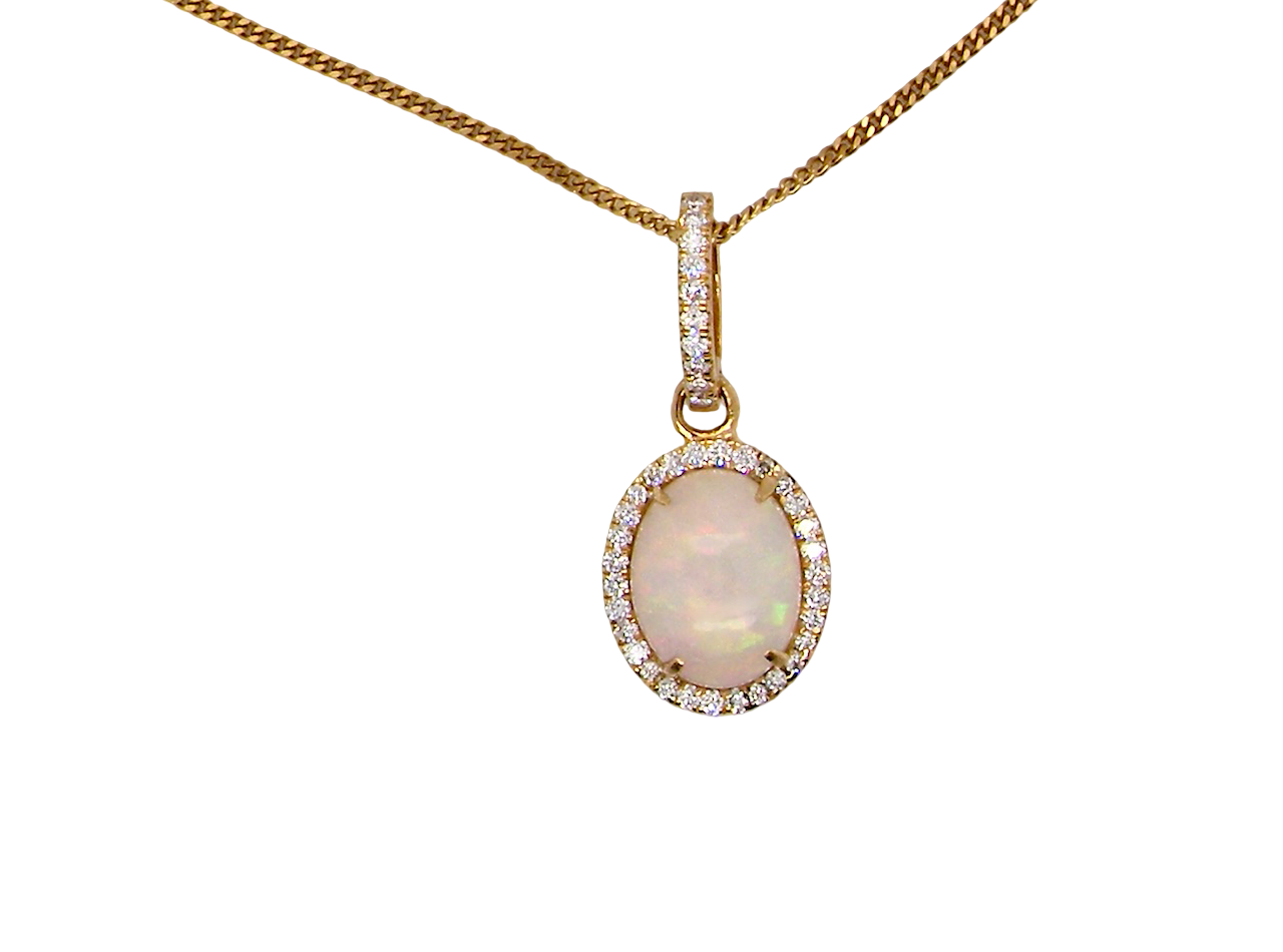 A fine opal and diamond pendant