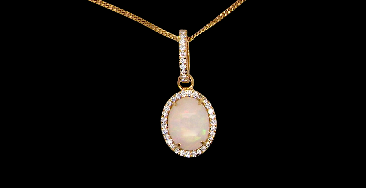 A fine opal and diamond pendant 1