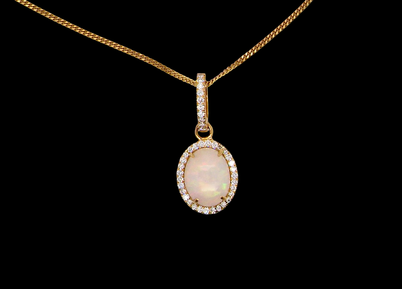 A fine opal and diamond pendant 1