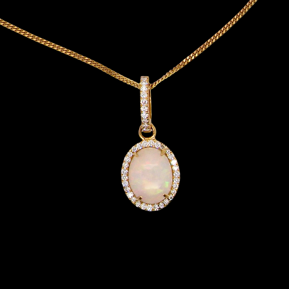 A fine opal and diamond pendant 1