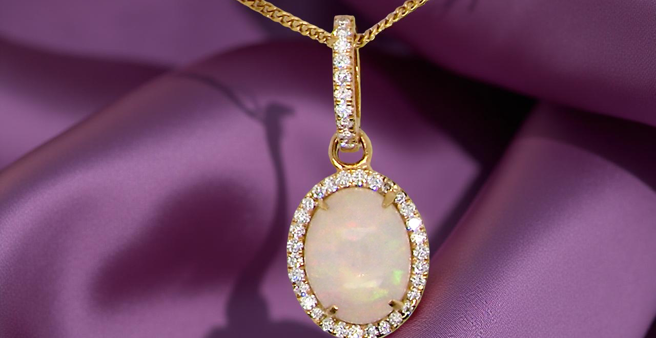 A fine opal and diamond pendant 2