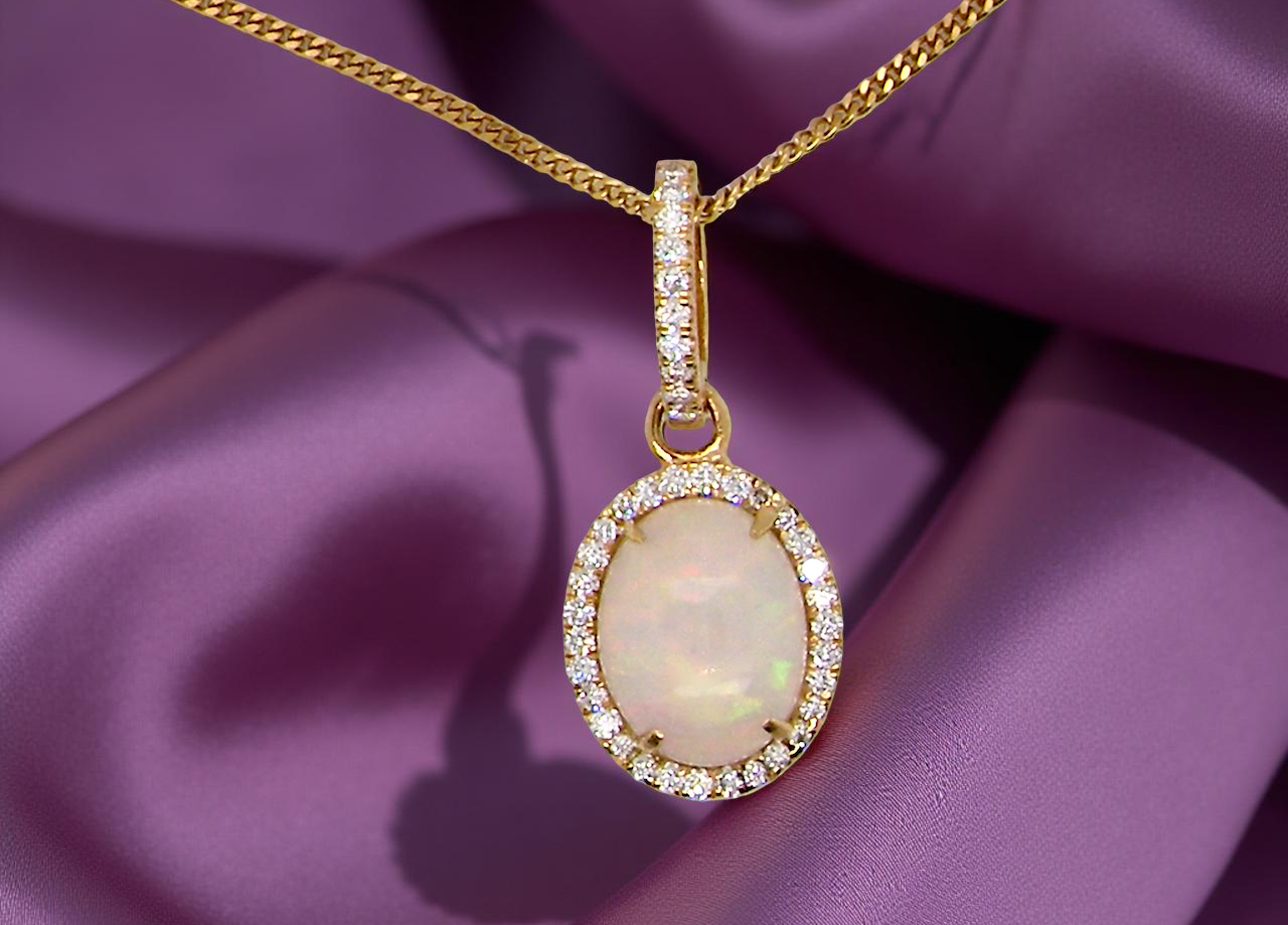 A fine opal and diamond pendant 2