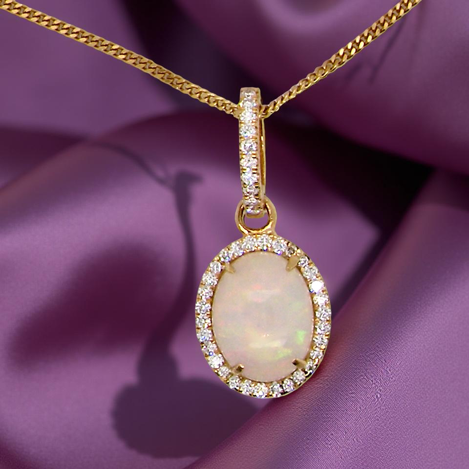 A fine opal and diamond pendant 2