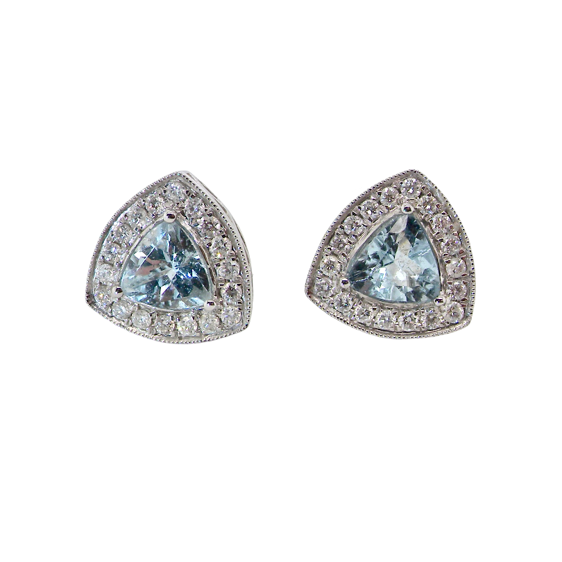 A fine pair of 18 carat white gold cluster earrings, each containing a trapeze cut aquamarine 6x6x6mm (1 carat) surrounded by eighteen x 0.02 carat diamonds