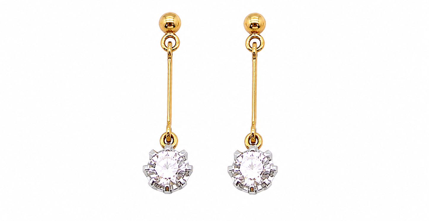 A fine pair of 18 carat yellow gold drop earrings.
Each modern brilliant cut white diamond measures 5mm (est half a carat each), claw set.
