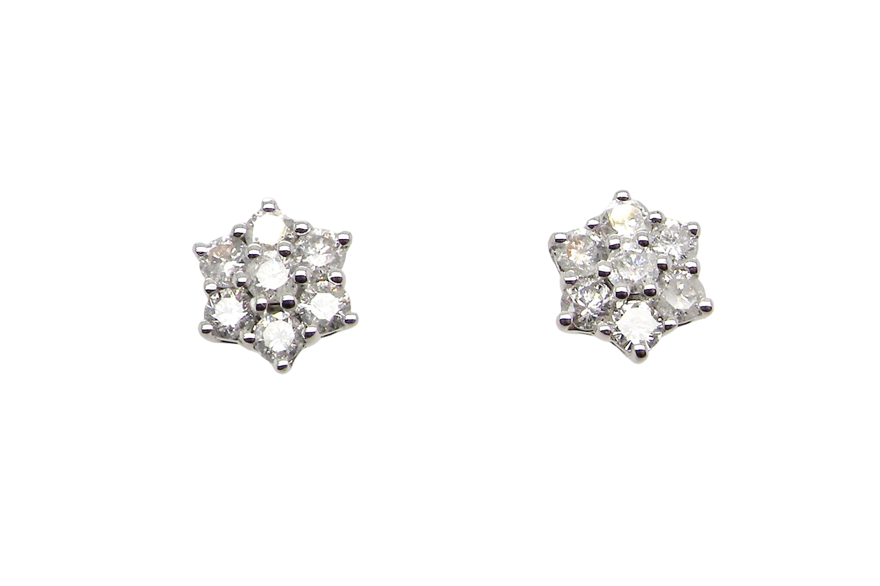 A fine pair of 9 carat white gold diamond stud earrings. 