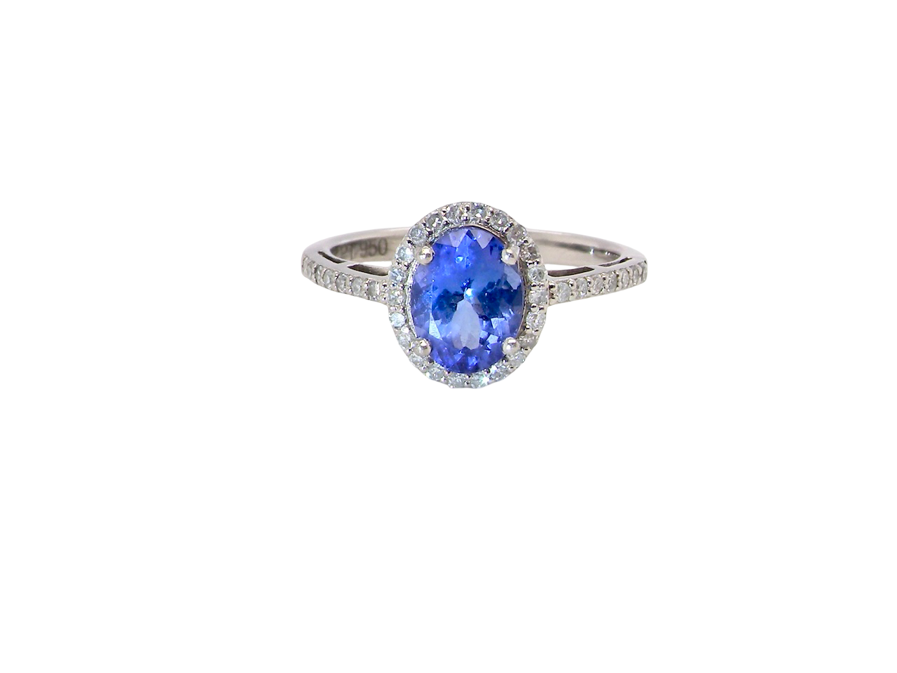 A fine platinum cluster ring showcasing a vibrant AAA tanzanite