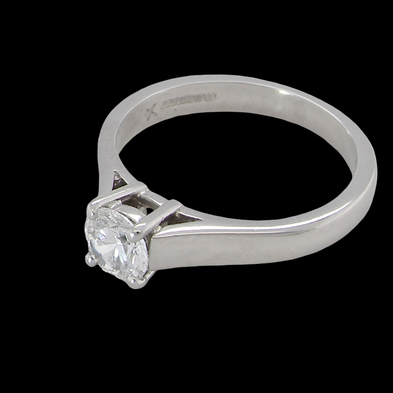 A fine solitaire ring, features an exceptional half carat diamond, brilliant cut, colour H-j, clarity VS2-Si1. Measures 5.2mm, depth 5.5mm, weight 4.9grams
side