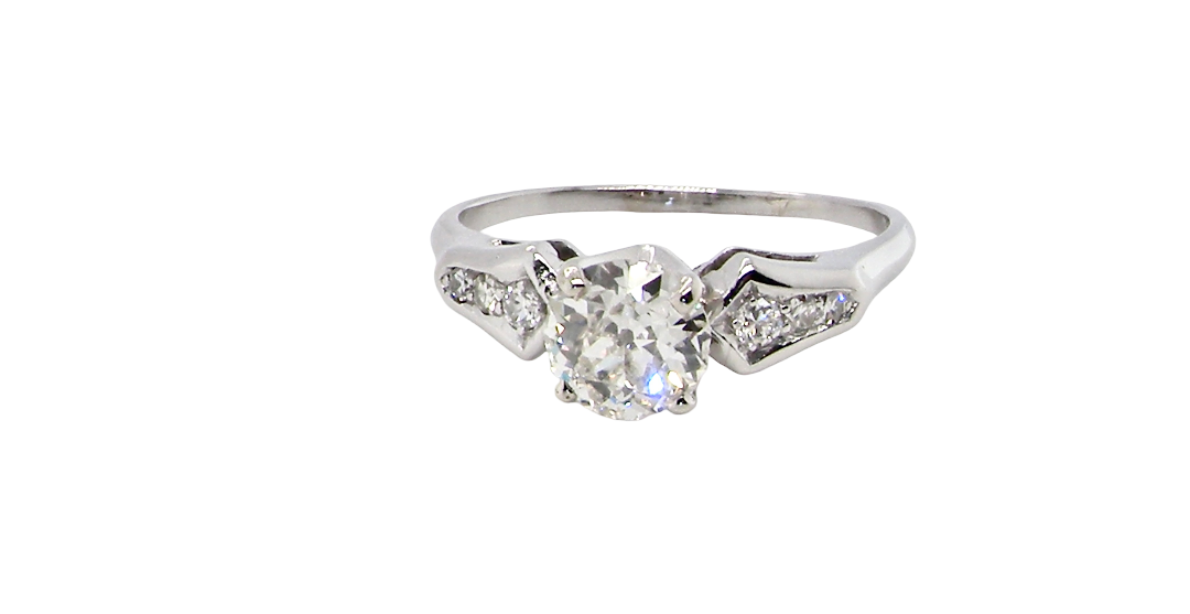 A fine solitaire ring featuring an e lovely brilliant cut white diamond. Measures 6.3mm (est 0.85 carats) very bright white stone, colour H-i, clarity VS. Head depth 7mm. 