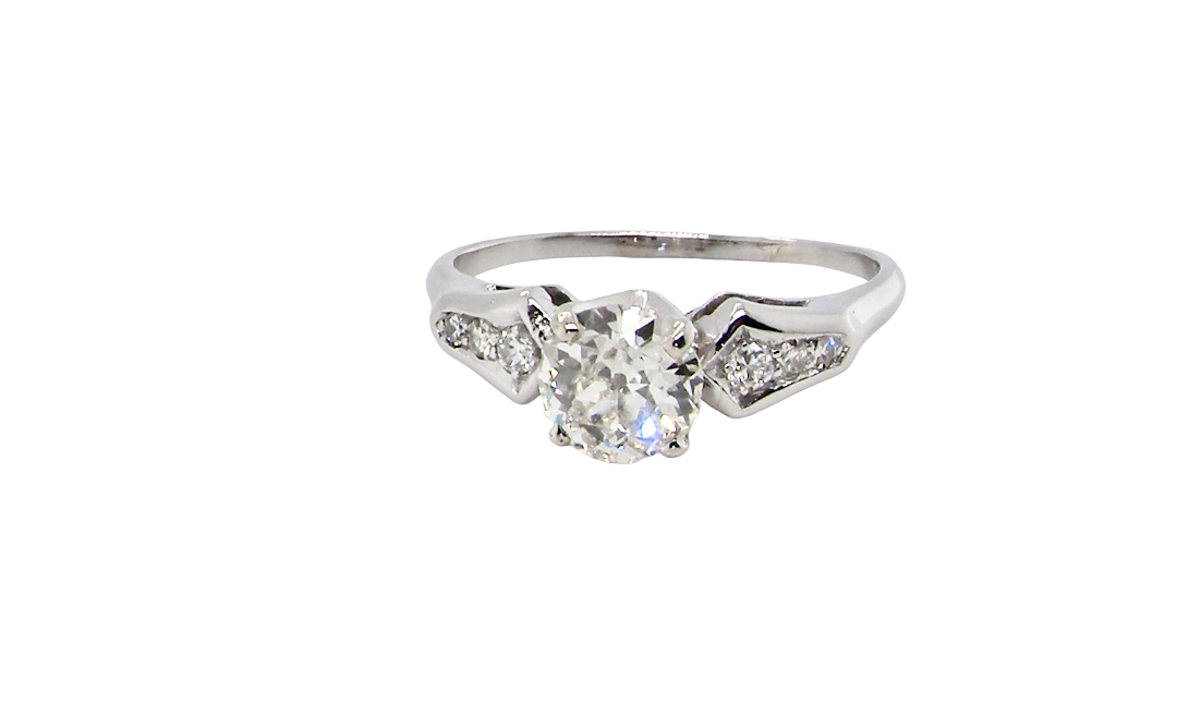 A fine solitaire ring featuring an e lovely brilliant cut white diamond. Measures 6.3mm (est 0.85 carats) very bright white stone, colour H-i, clarity VS. Head depth 7mm. 