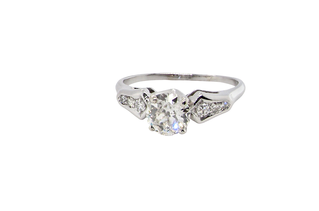 A fine solitaire ring featuring an e lovely brilliant cut white diamond. Measures 6.3mm (est 0.85 carats) very bright white stone, colour H-i, clarity VS. Head depth 7mm. 