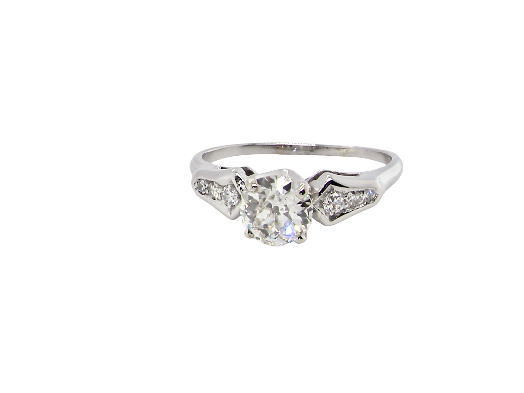 A fine solitaire ring featuring an e lovely brilliant cut white diamond. Measures 6.3mm (est 0.85 carats) very bright white stone, colour H-i, clarity VS. Head depth 7mm. 