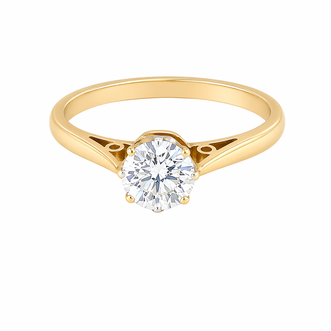 A fine solitaire ring set with a brilliant cut white diamond.
Certificated and therefore the description is confirmed. Size 5.5x5.2mm, 0.70 carats. Colour G, clarity Si1.