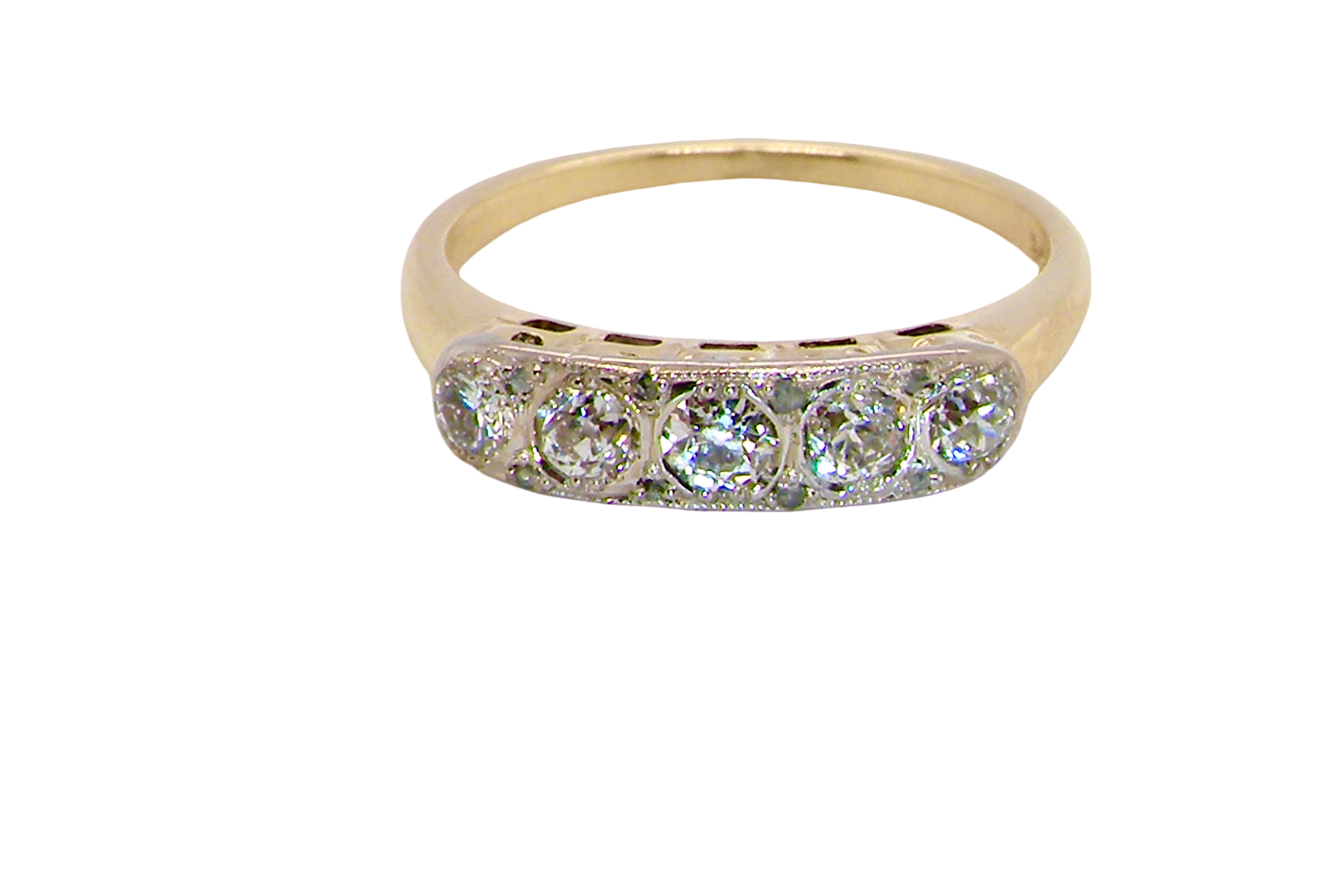 A fine vintage ring set with five brilliant cut white diamonds.
Centre diamond 3.6mm (est 0.15 carats)