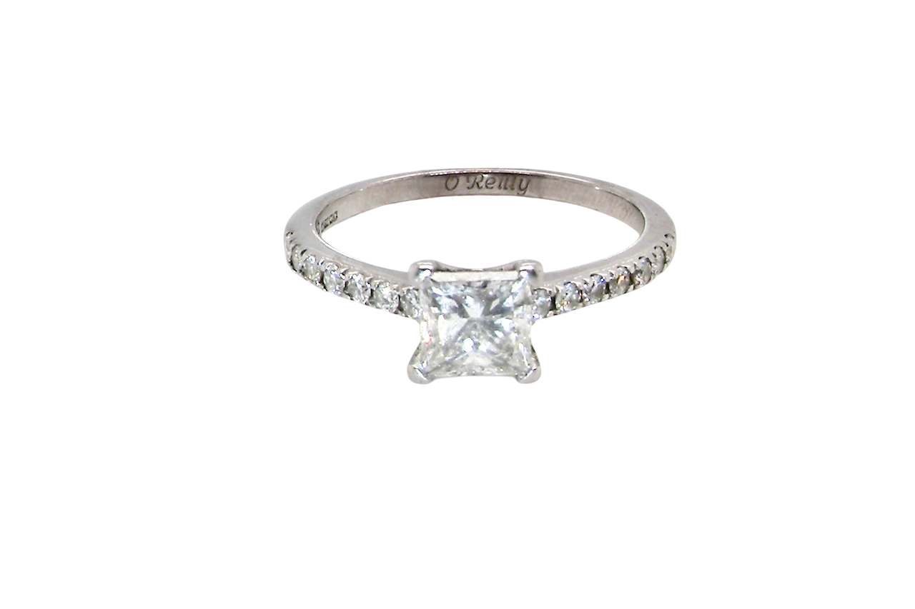 Diamond ring with a clear gemstone on a white background