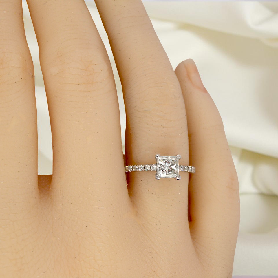 A fine white gold solitaire diamond ring