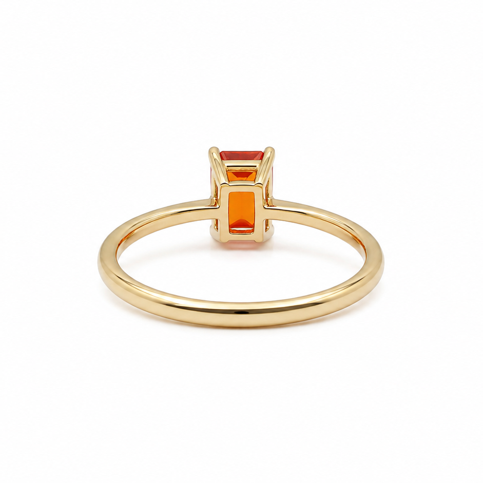 A rectangular fire opal solitaire ring rear view