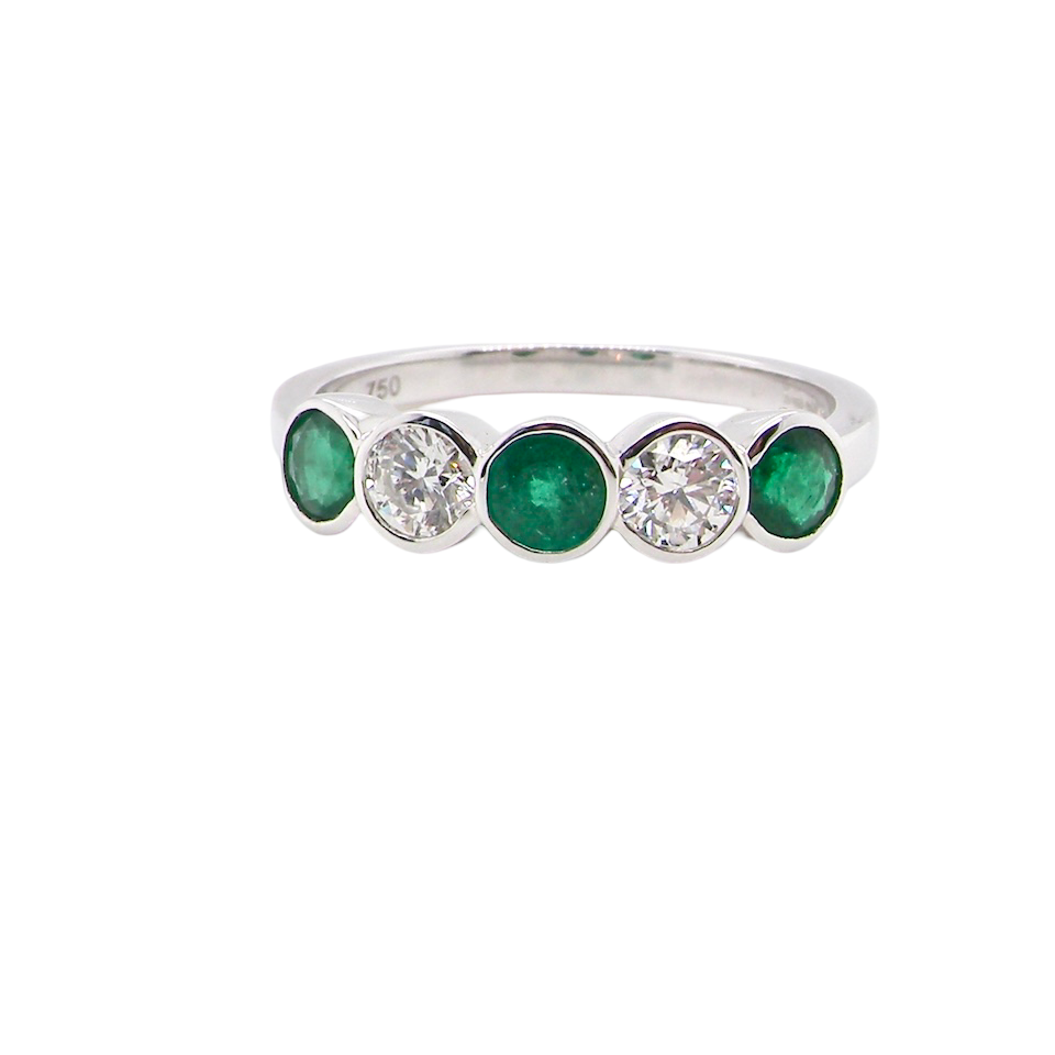A five stone Emerald and Diamond ring