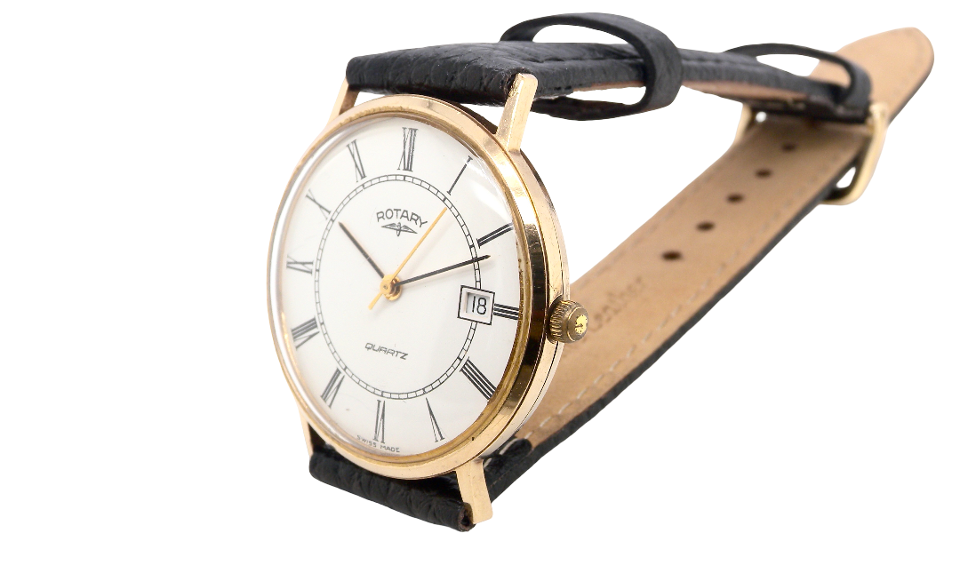 A gentleman's 9 carat gold wrist watch. Plain white dial with roman numerals, sweep seconds hand, and a calendar date window.
Case measures 32mm. Signed by Rotary.