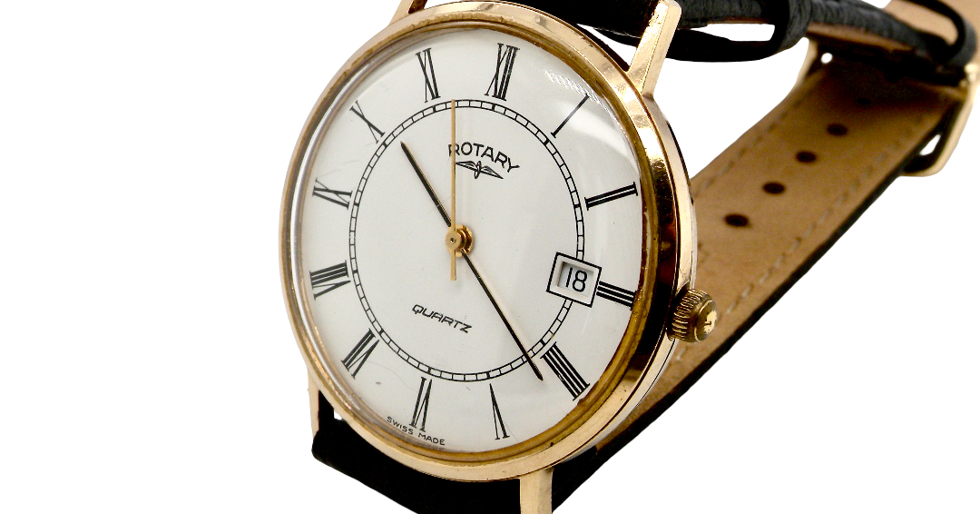A gentleman's 9 carat gold wrist watch. Plain white dial with roman numerals, sweep seconds hand, and a calendar date window.
Quartz movement. Signed by Rotary.