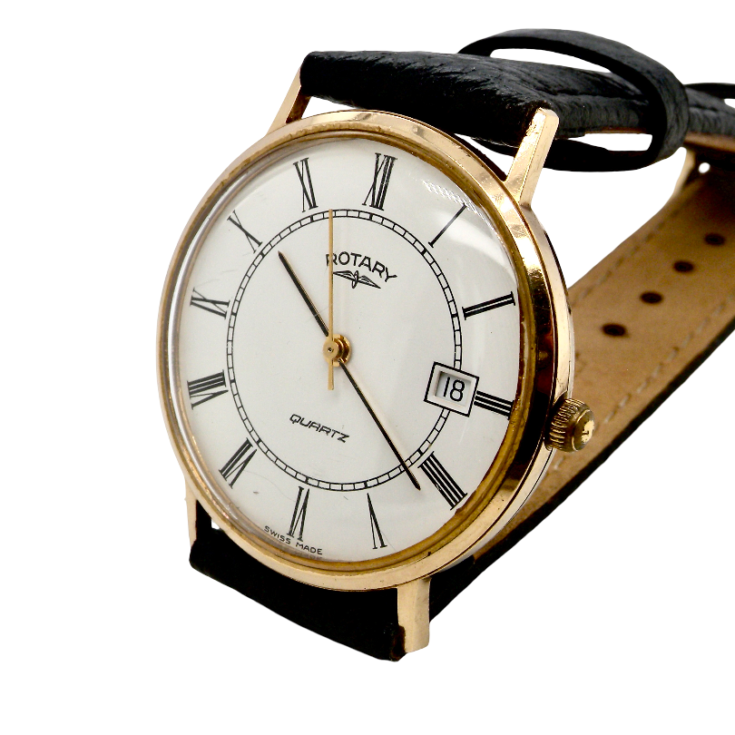A gentleman's 9 carat gold wrist watch. Plain white dial with roman numerals, sweep seconds hand, and a calendar date window.
Quartz movement. Signed by Rotary.