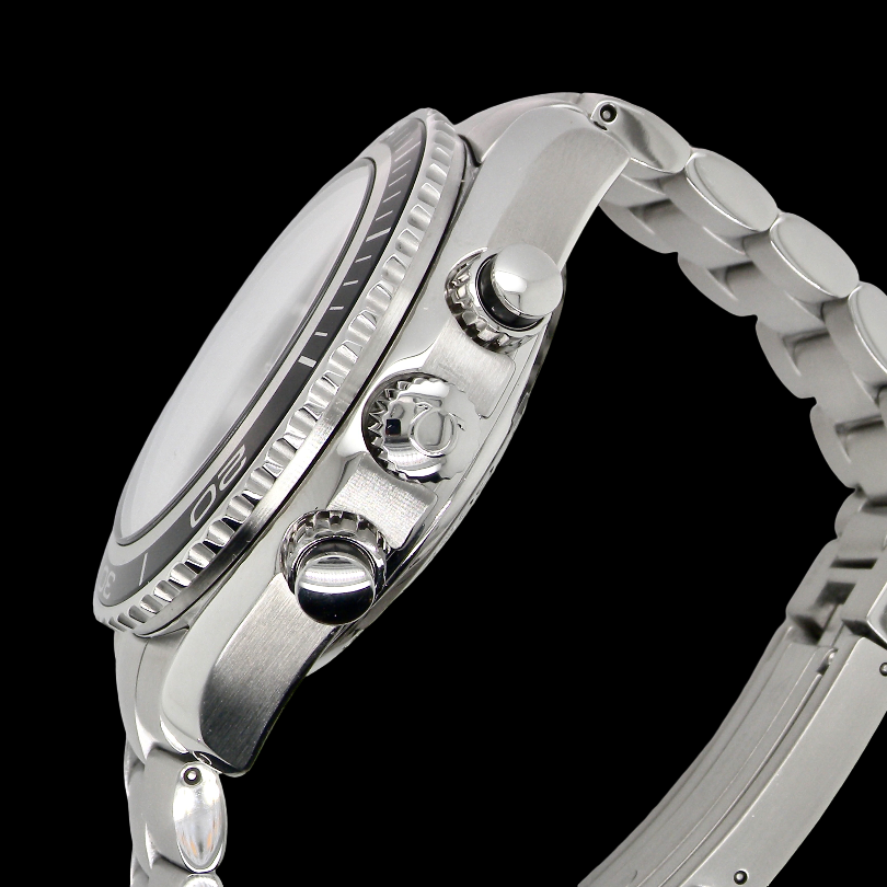 Close-up side profile of a silver stainless steel watch with a matching metal link bracelet, featuring a textured bezel, crown, and pushers against a solid black background.