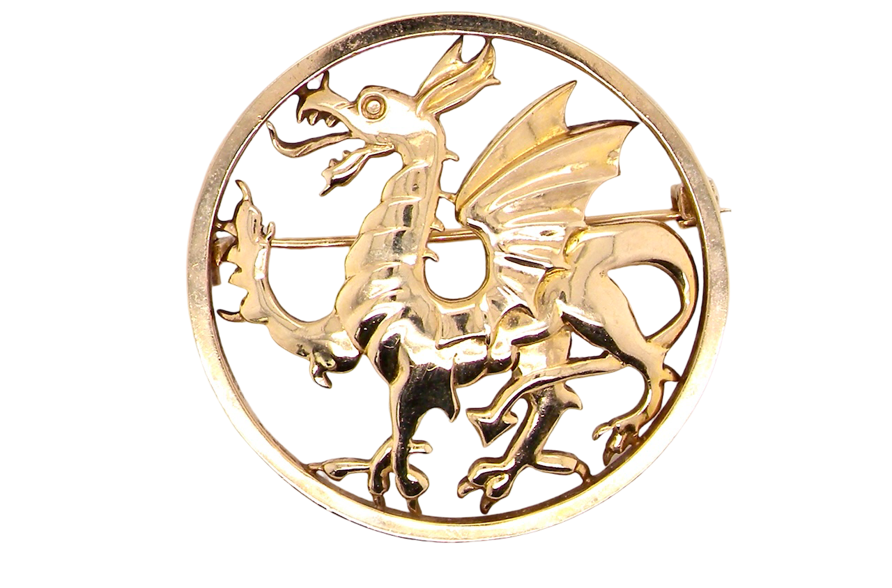 A gold dragon brooch