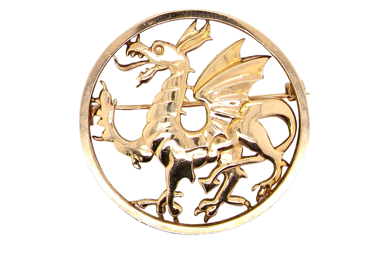 A gold dragon brooch