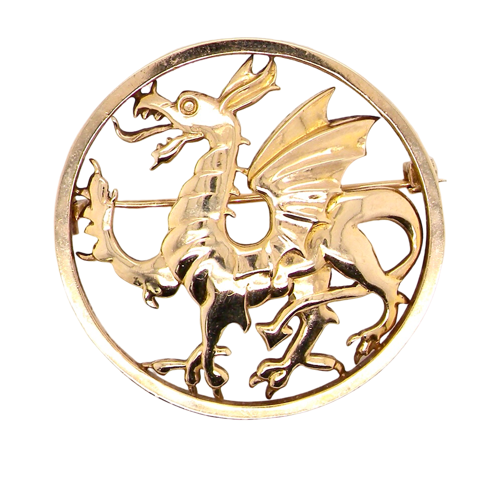 A gold dragon brooch